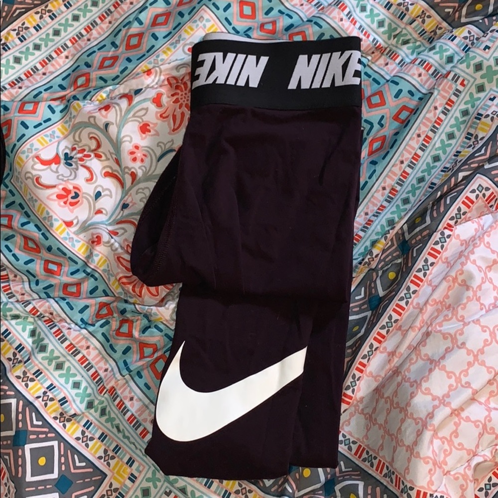 Purple Nike leggings with Nike band